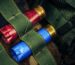 Two hunting cartridges in ammunition belt close up